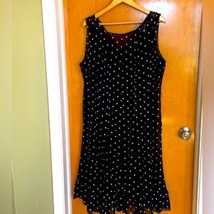 Slip dress with sheer polka dot overlay.